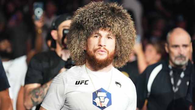 Merab Dvalishvili makes his walk for a UFC bantamweight fight.
